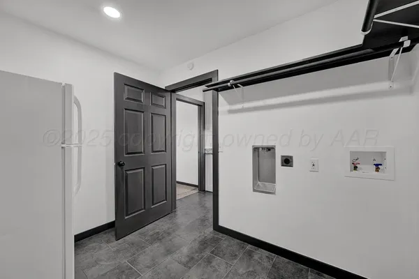 a view of a hallway with closet area