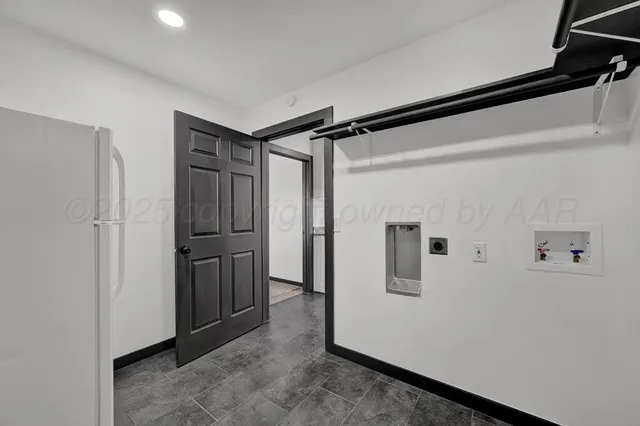 a view of a hallway with closet area