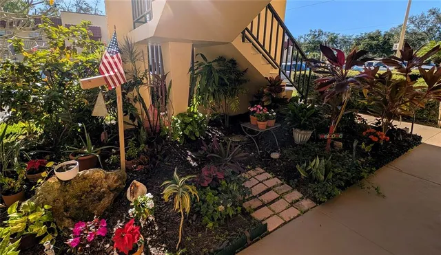 a view of a pathway with a yard