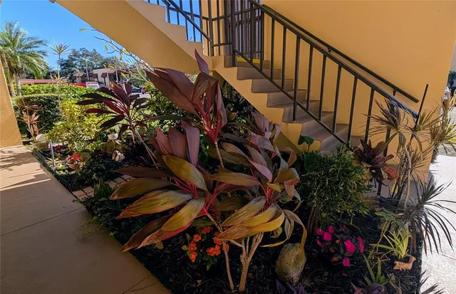 a view of entryway with wooden stairs