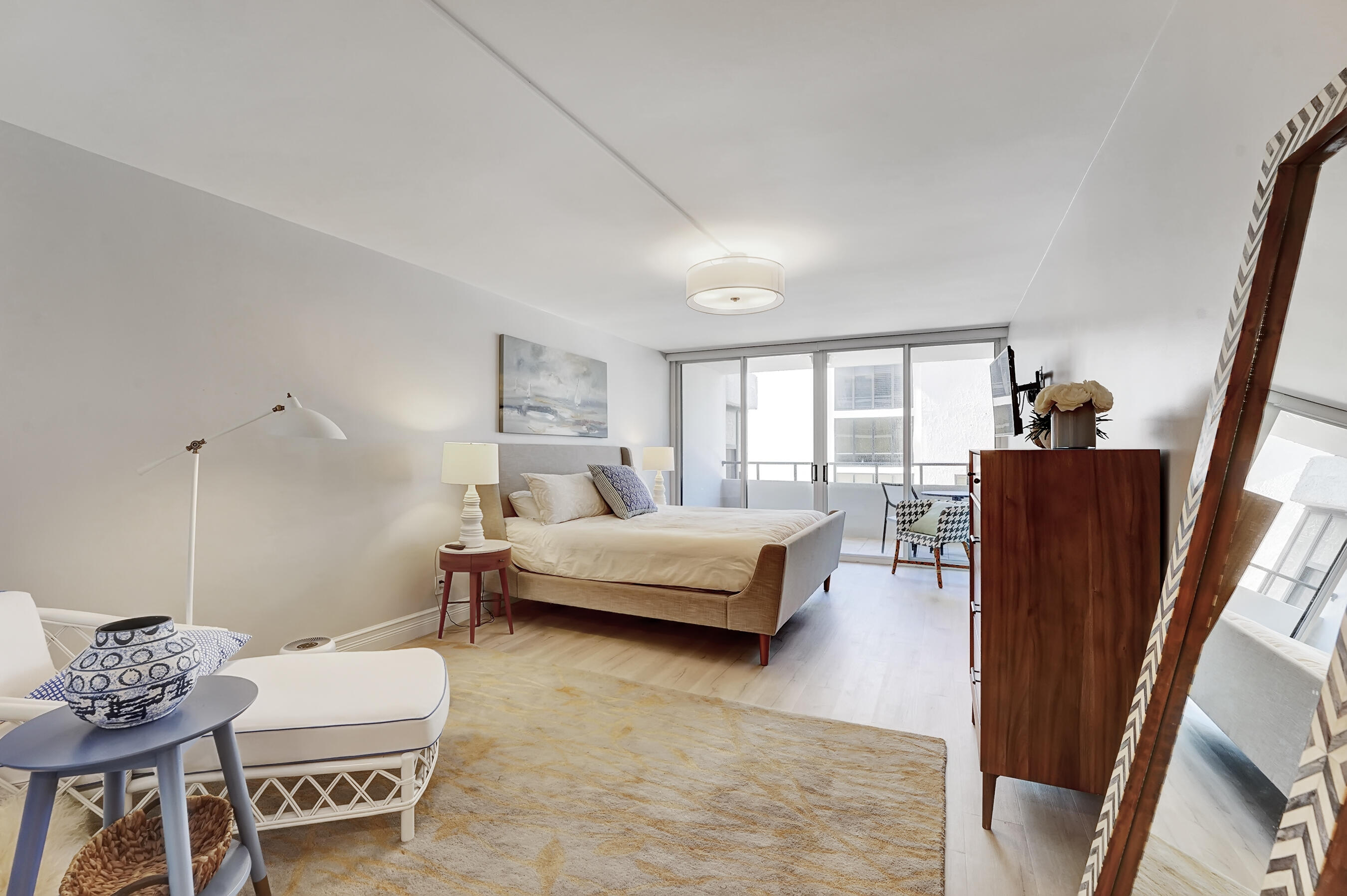 2175 South Ocean Boulevard, Unit 304 Delray Beach, FL 33483 - Photo 12 of 28 a living room with furniture and a couch