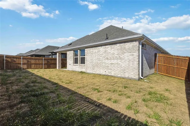 a bathroom with a sink and shower