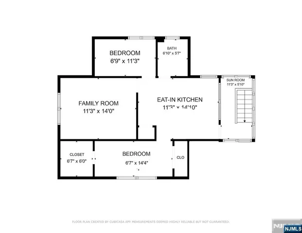 a picture of a book and a white bed