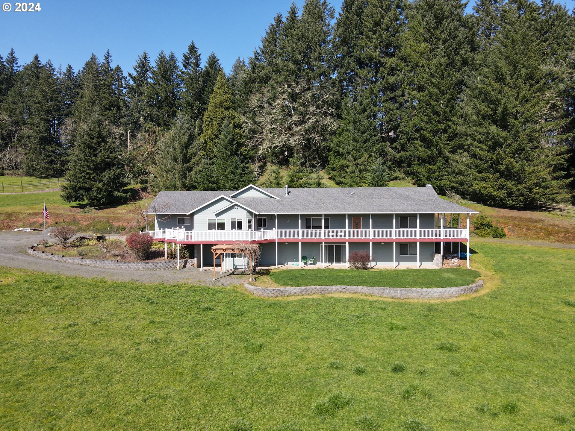 33825 Cea Jac Road Creswell, OR 97426 - Photo 1 of 48 a view of a house with a big yard and large trees