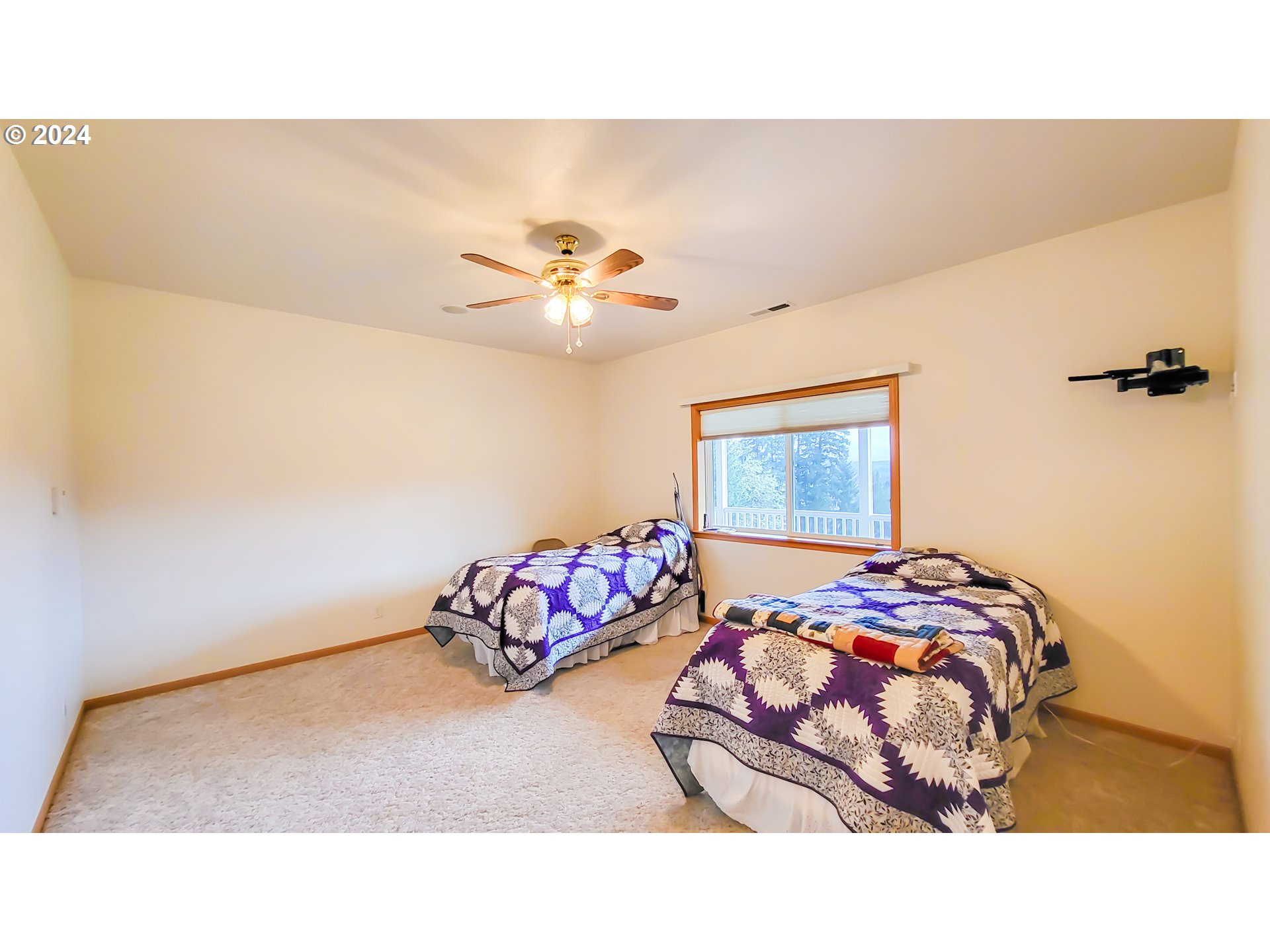 33825 Cea Jac Road Creswell, OR 97426 - Photo 12 of 48 a bedroom with a bed and a painting on the wall