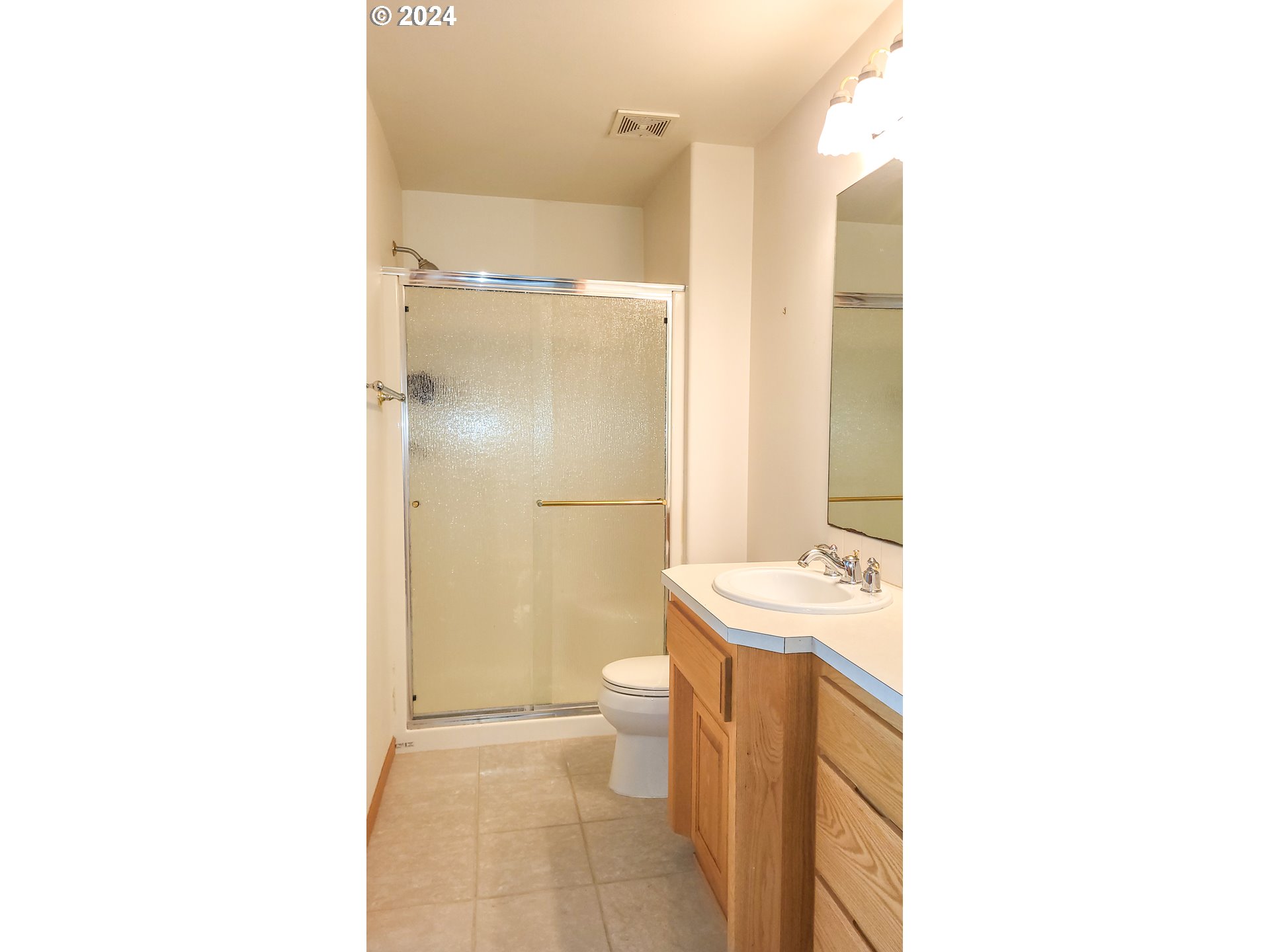 33825 Cea Jac Road Creswell, OR 97426 - Photo 23 of 48 a bathroom with a sink a toilet a mirror and shower