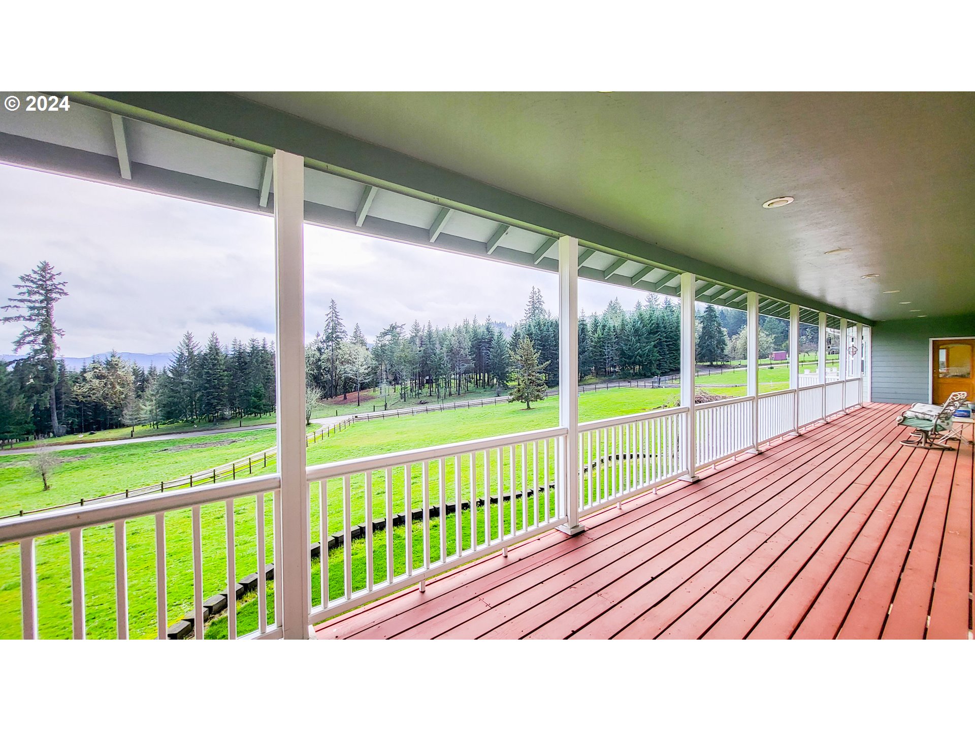 33825 Cea Jac Road Creswell, OR 97426 - Photo 25 of 48 a view of balcony with wooden floor