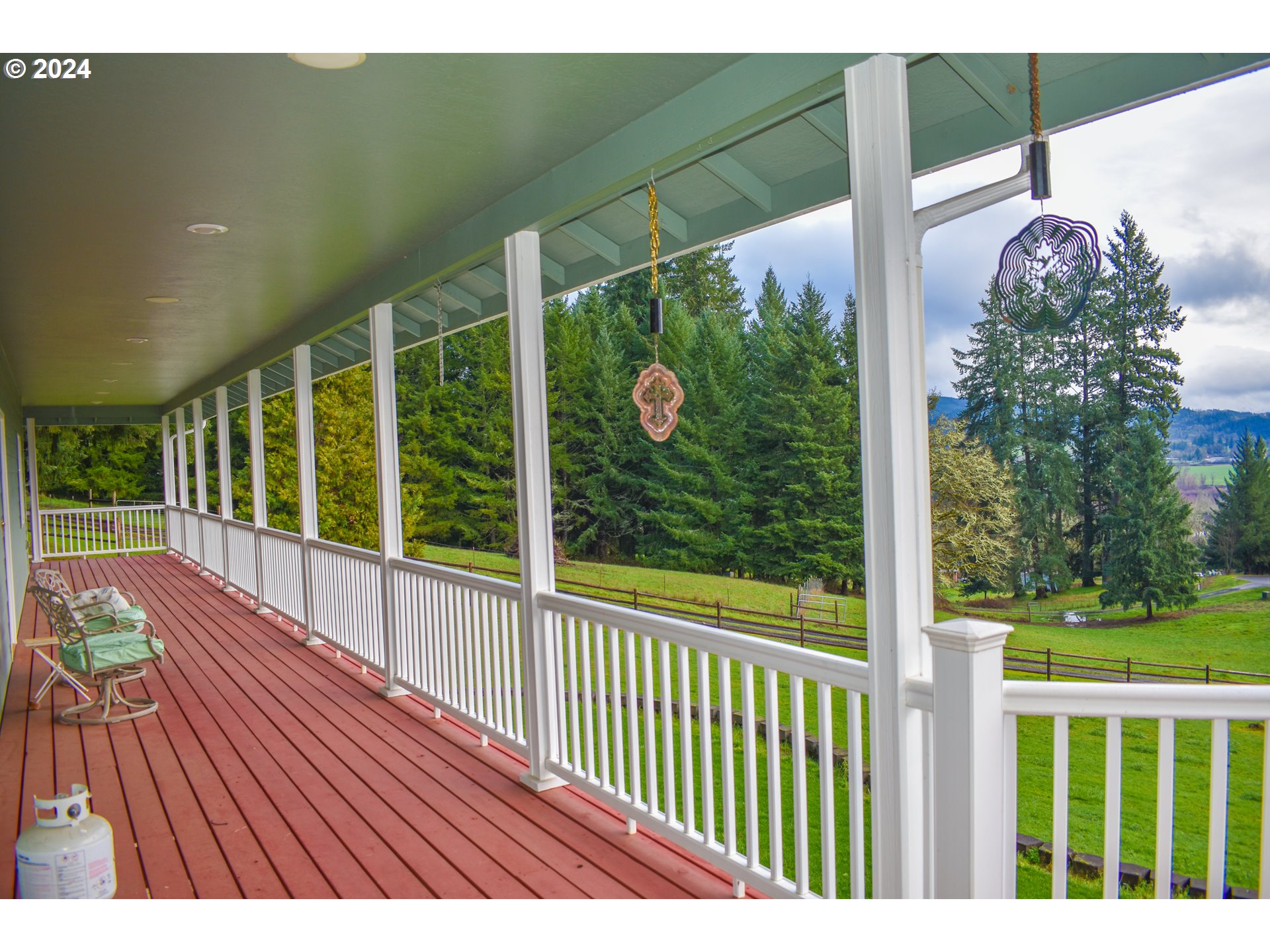 33825 Cea Jac Road Creswell, OR 97426 - Photo 26 of 48 a view of balcony with wooden floor