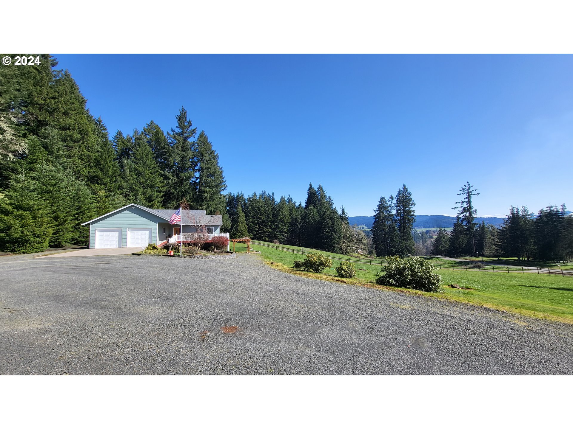 33825 Cea Jac Road Creswell, OR 97426 - Photo 32 of 48 a view of a road with a building in the background