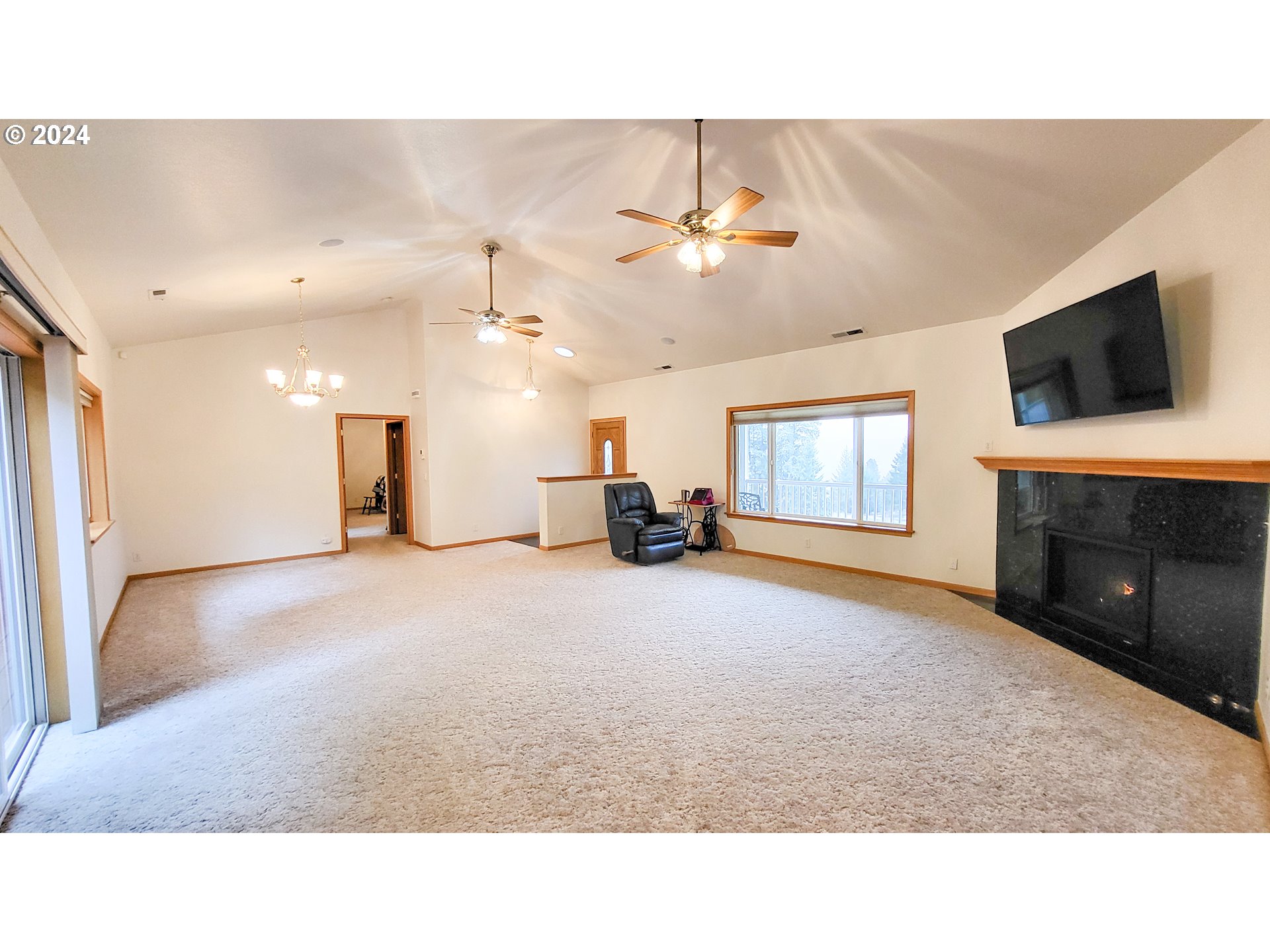 33825 Cea Jac Road Creswell, OR 97426 - Photo 5 of 48 a living room with furniture and a fireplace