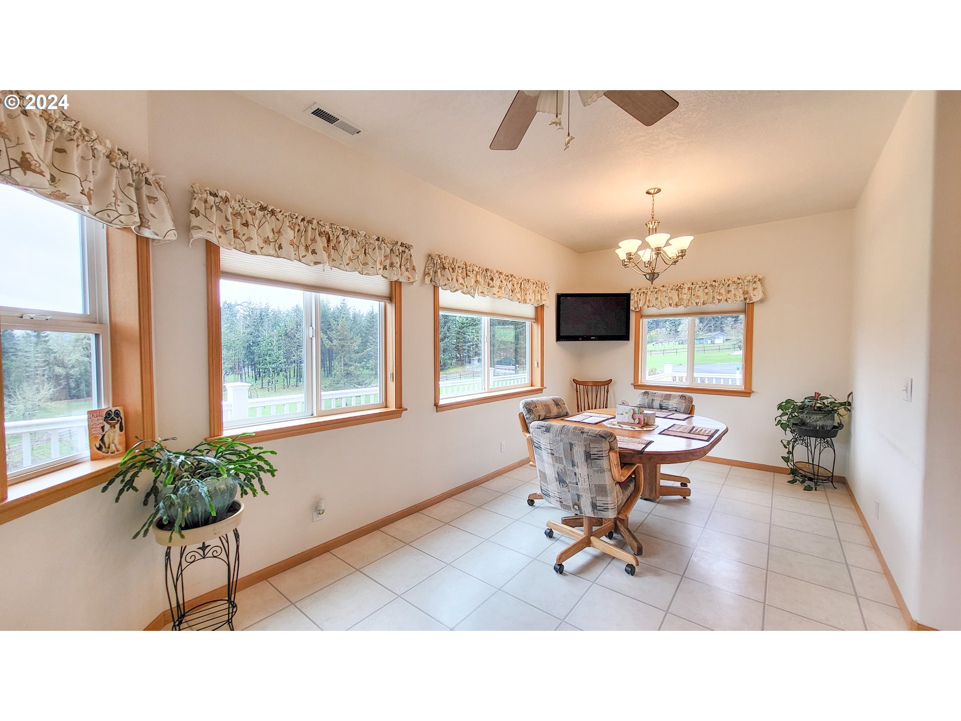 33825 Cea Jac Road Creswell, OR 97426 - Photo 7 of 48 a living room with furniture and a large window