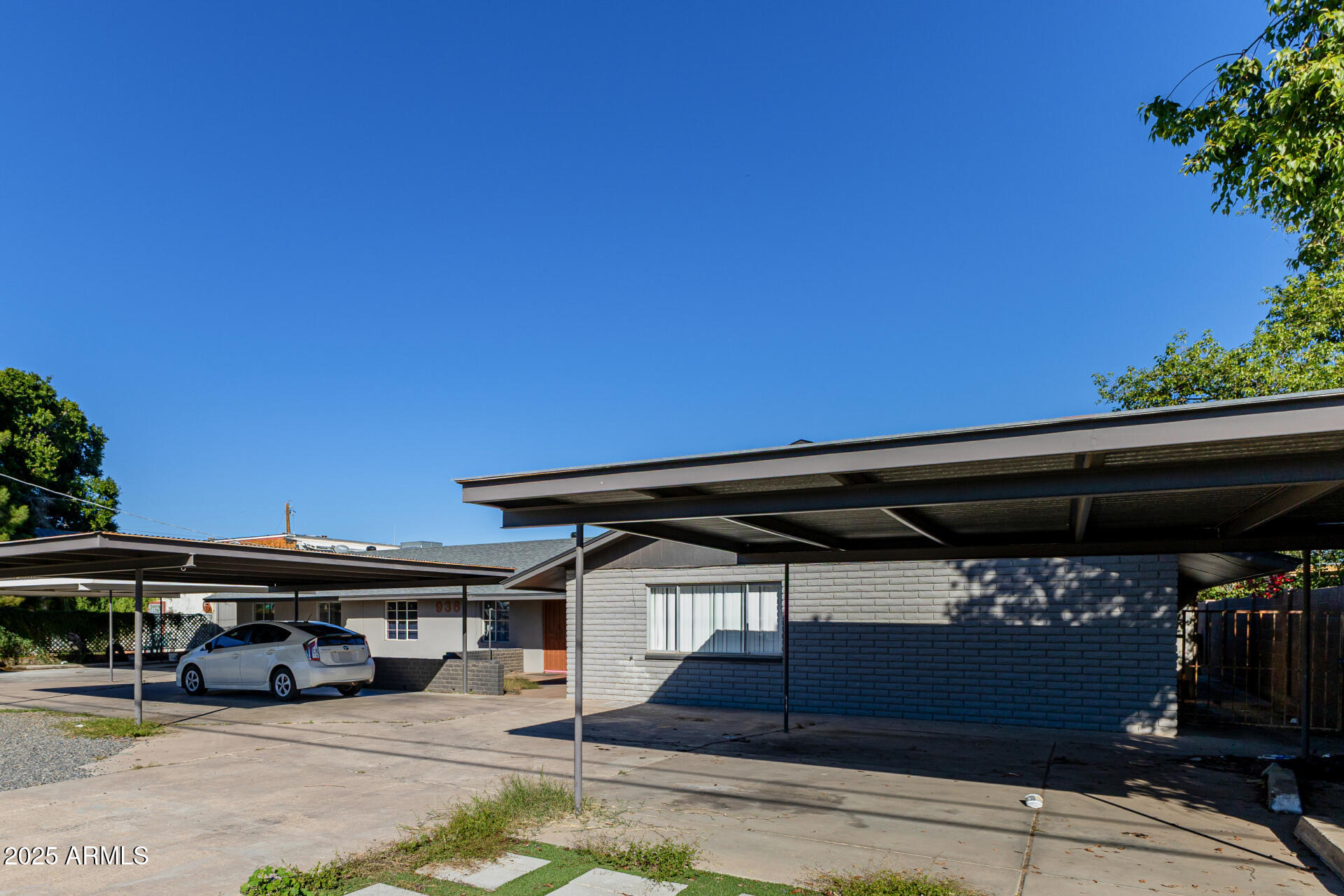 936 West Rio Salado Parkway, Unit 3 Mesa, AZ 85201 - Photo 2 of 26 a view of car parked in garage