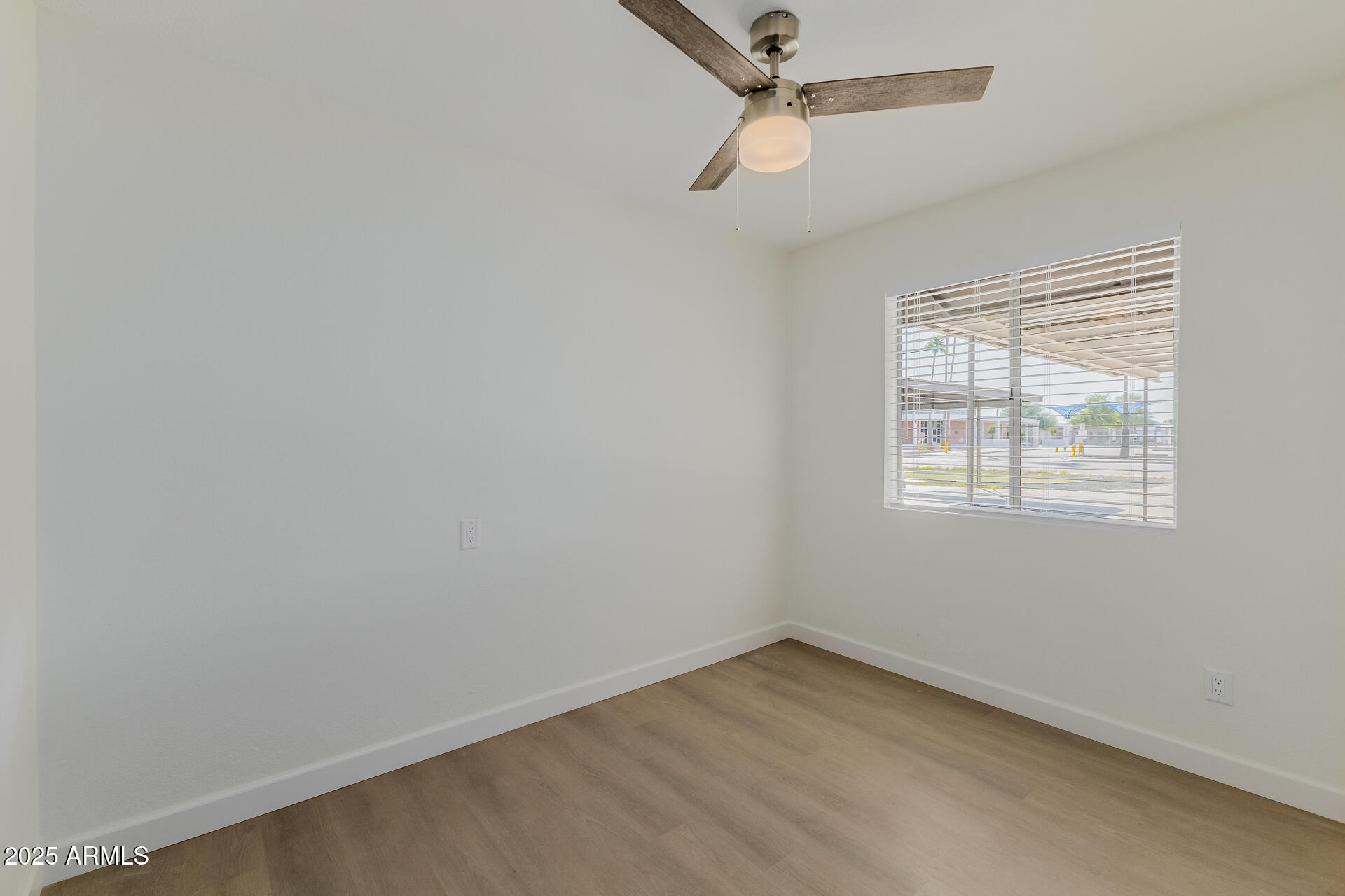 936 West Rio Salado Parkway, Unit 3 Mesa, AZ 85201 - Photo 22 of 26 an empty room with a window