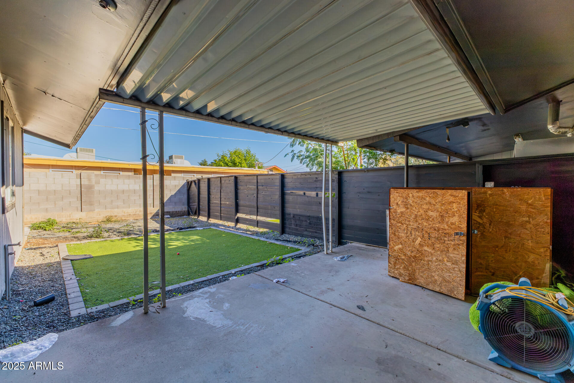 936 West Rio Salado Parkway, Unit 3 Mesa, AZ 85201 - Photo 25 of 26 a view of a backyard with wooden fence