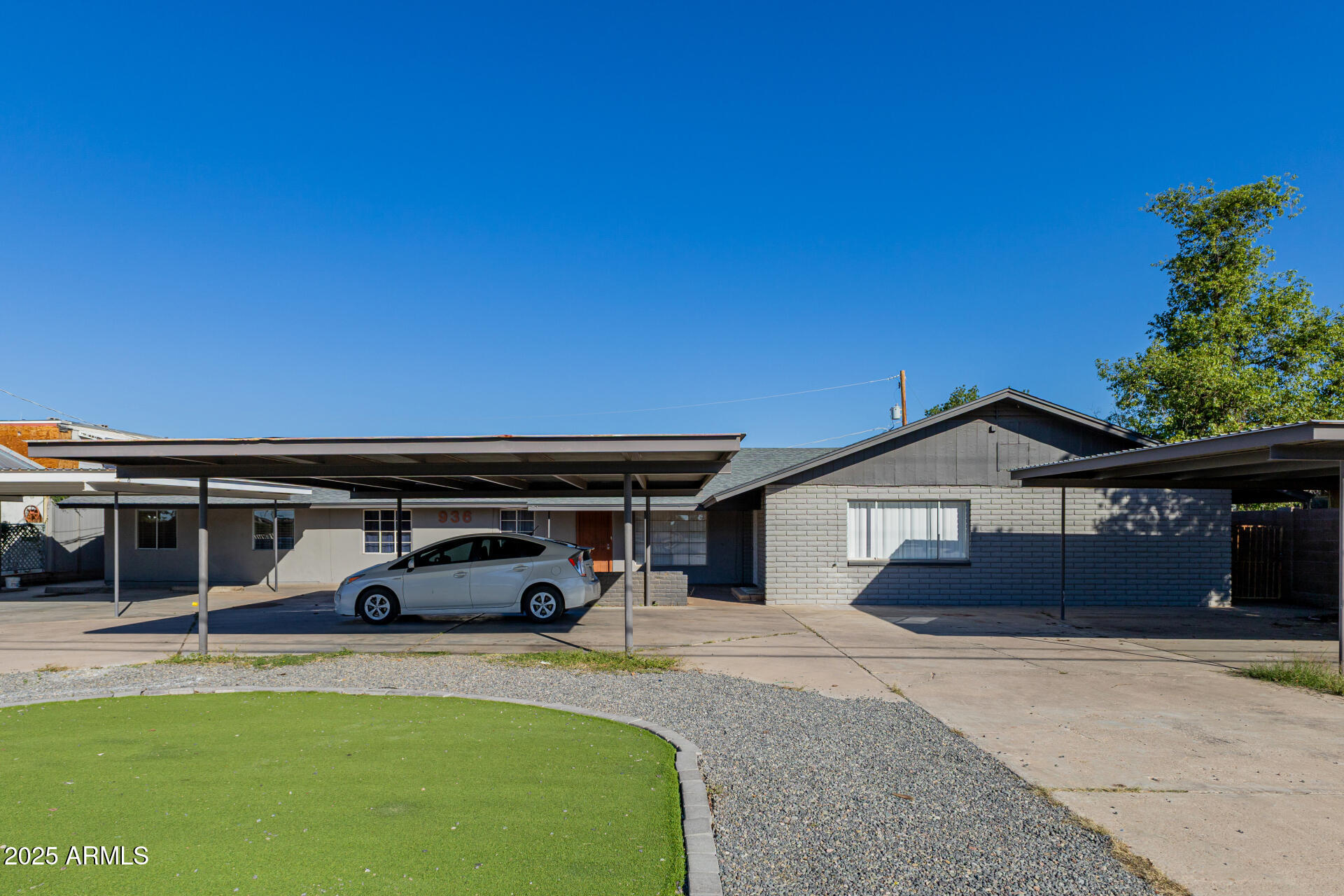 936 West Rio Salado Parkway, Unit 3 Mesa, AZ 85201 - Photo 3 of 26 a front view of a house with swimming pool