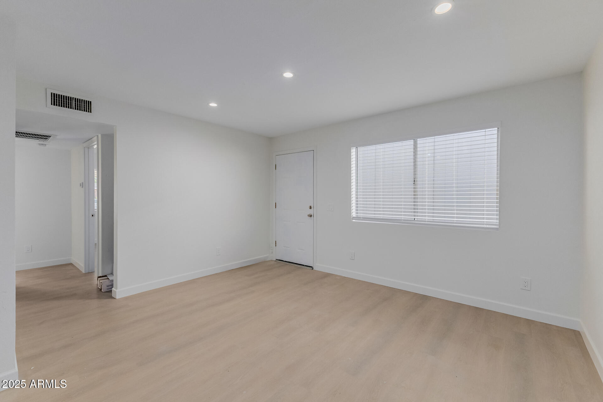 936 West Rio Salado Parkway, Unit 3 Mesa, AZ 85201 - Photo 5 of 26 an empty room with a empty space and windows