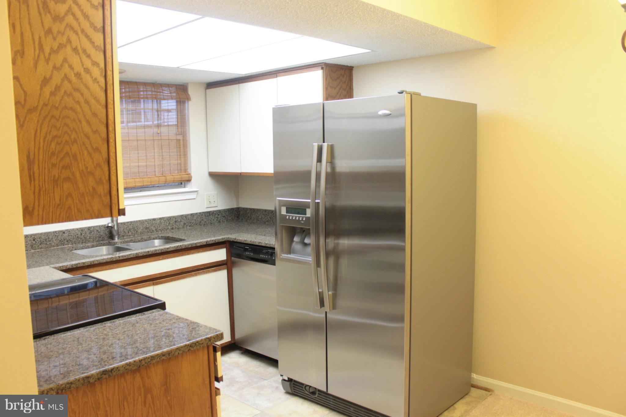 12003 Golf Ridge Court, Unit 102 Fairfax, VA 22033 - Photo 2 of 21 Stainless Steel Appliances in Kitchen