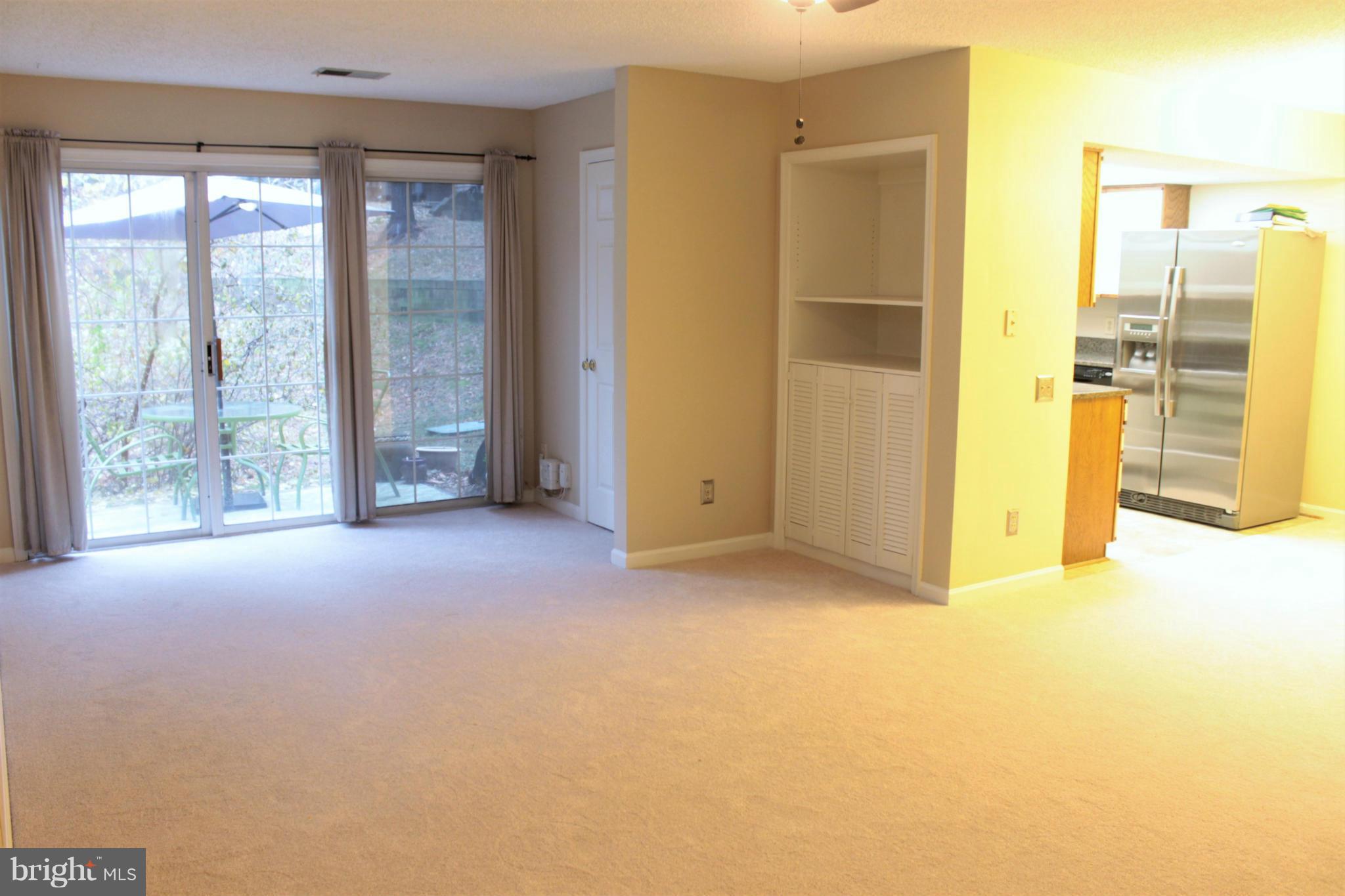 12003 Golf Ridge Court, Unit 102 Fairfax, VA 22033 - Photo 4 of 21 Living Room opens to rear patio