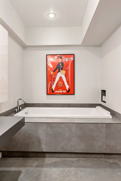 37 Bay State Road, Unit 3 Boston, MA 02215 - Photo 12 of 18 a room with a sink and a mirror