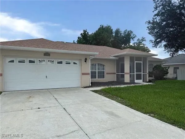 front view of a house with a yard