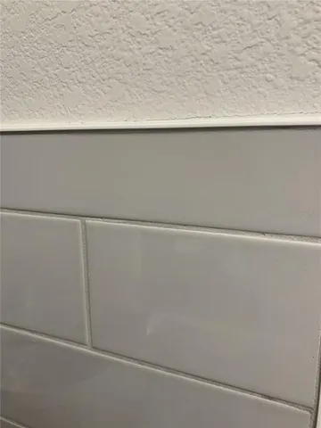 a kitchen with stainless steel appliances a stove a microwave a refrigerator and a sink