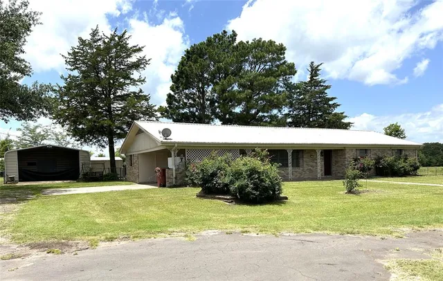 a view of a house with a swimming pool