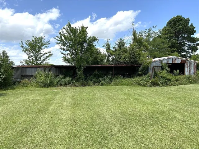 a view of a backyard with a garden