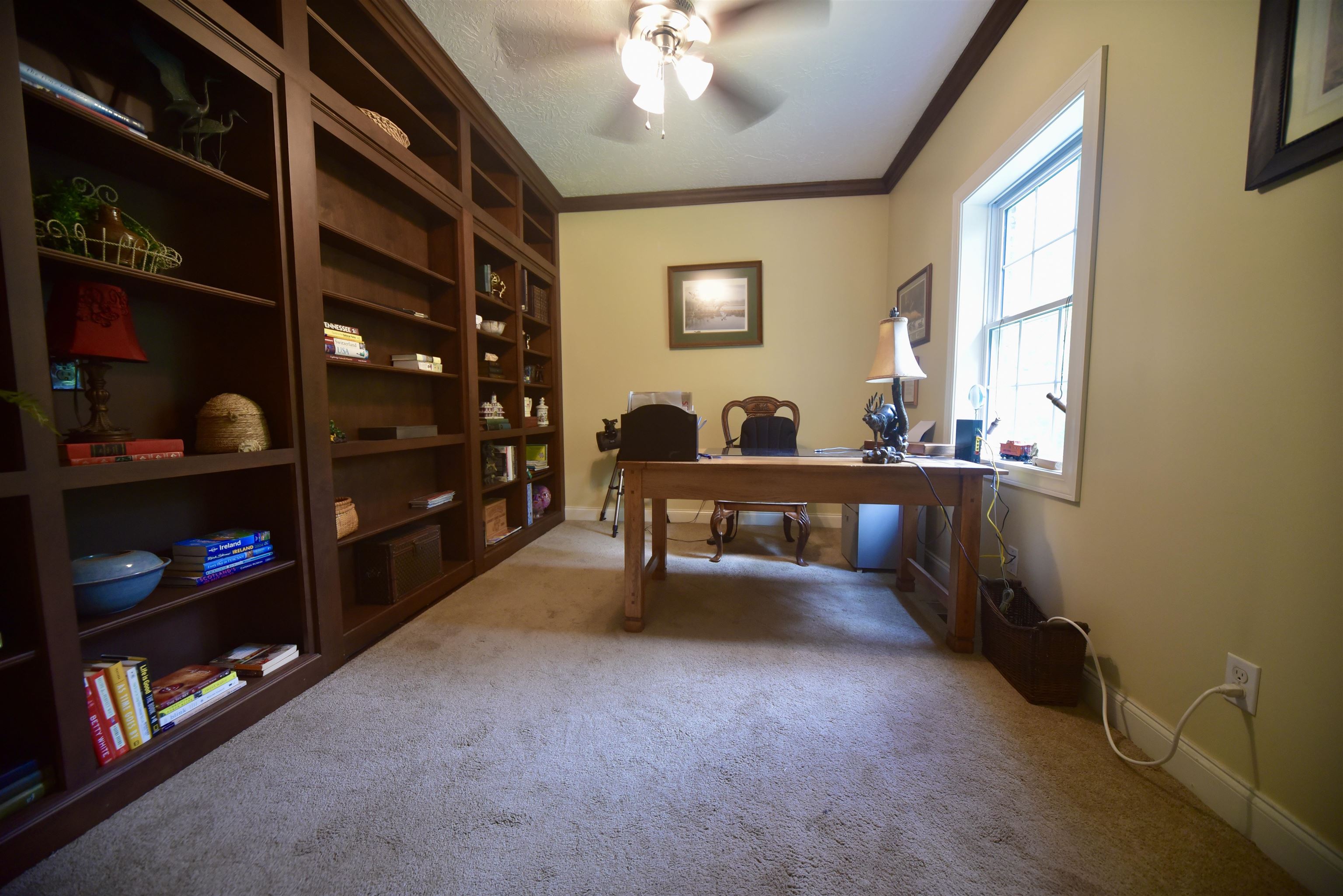 1359 Macks Grove Road Palmersville, TN 38241 - Photo 19 of 40 Carpeted home office with ornamental molding, a ceiling fan, and baseboards
