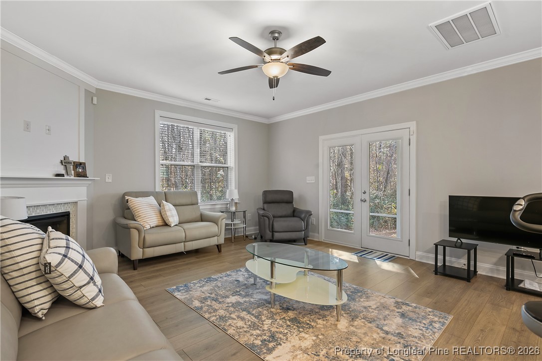 88 Spruce Hollow Circle Spring Lake, NC 28390 - Photo 22 of 48 a living room with furniture and a large window