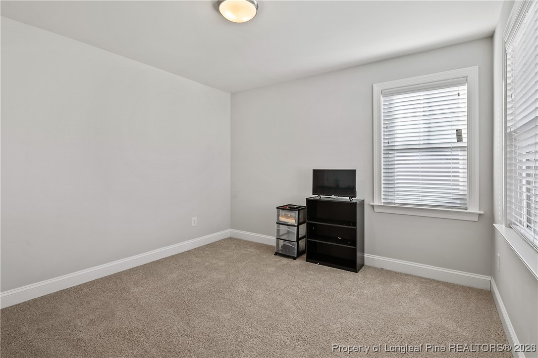 88 Spruce Hollow Circle Spring Lake, NC 28390 - Photo 37 of 48 an empty room with a window