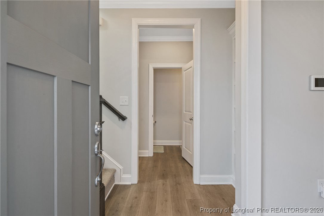 88 Spruce Hollow Circle Spring Lake, NC 28390 - Photo 4 of 48 a view of entryway with wooden floor