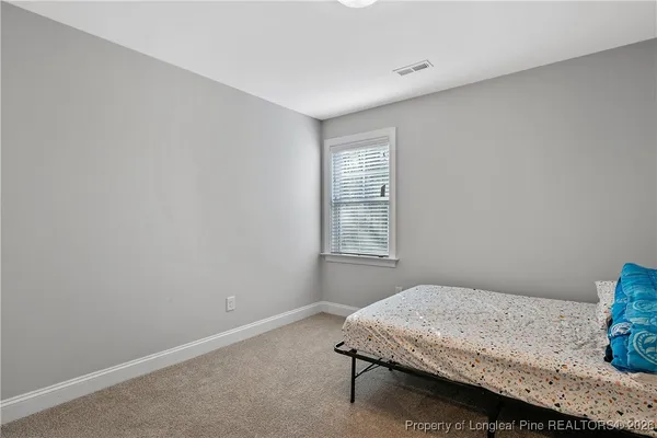 a room with a table and a window