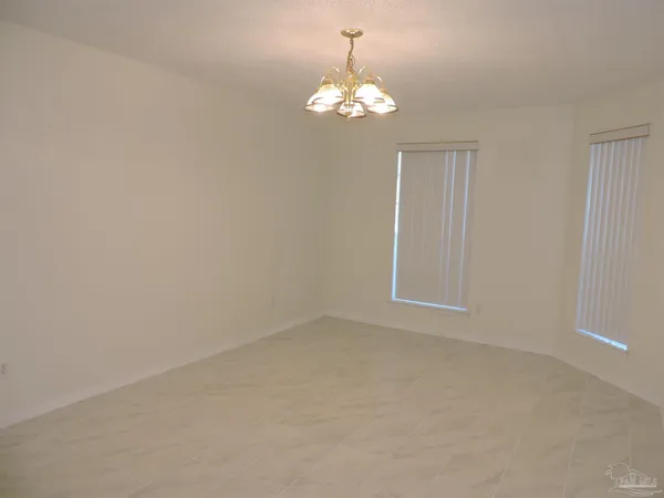 a view of livingroom with hardwood floor and a ceiling fan