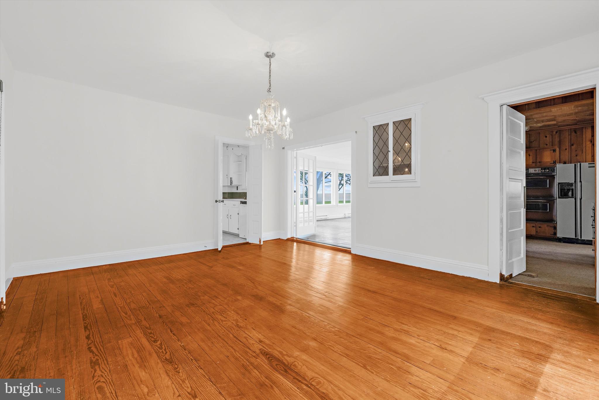 500 Nesbit Road Queenstown, MD 21658 - Photo 10 of 53 a view of empty room with wooden floor