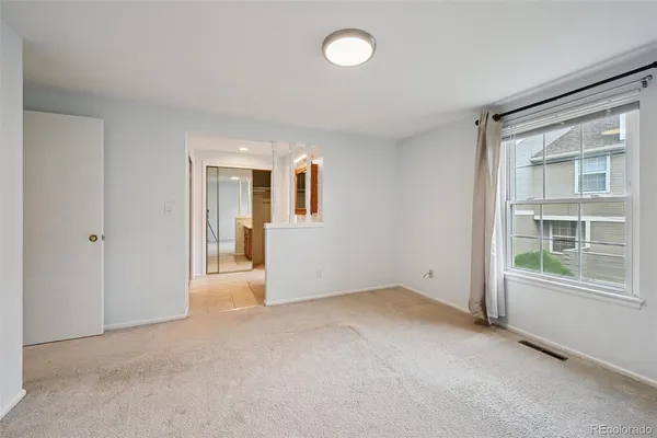 an empty room with windows