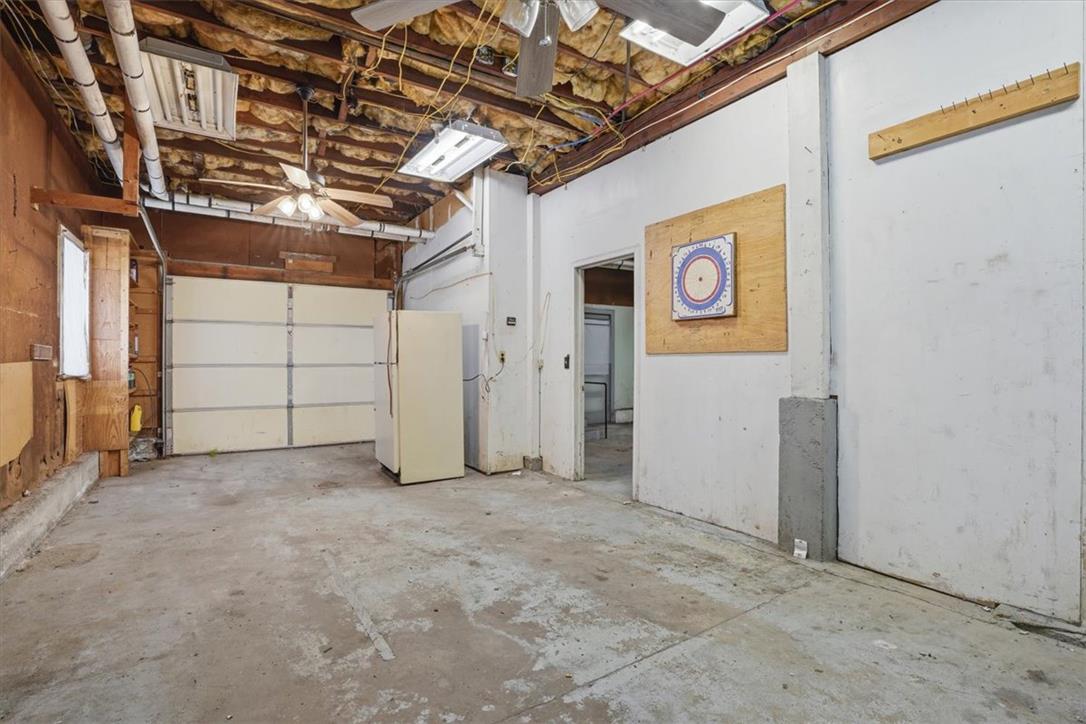 167 Main Road Lehighton, PA 18235 - Photo 33 of 41 A spacious, bare garage with ample room for vehicles and storage.
