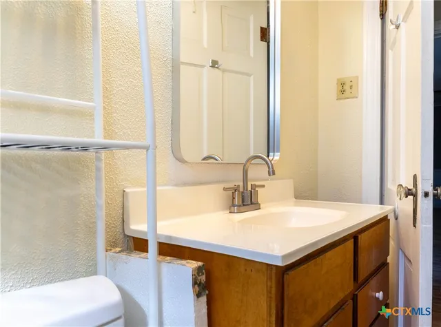 a view of backyard of the house