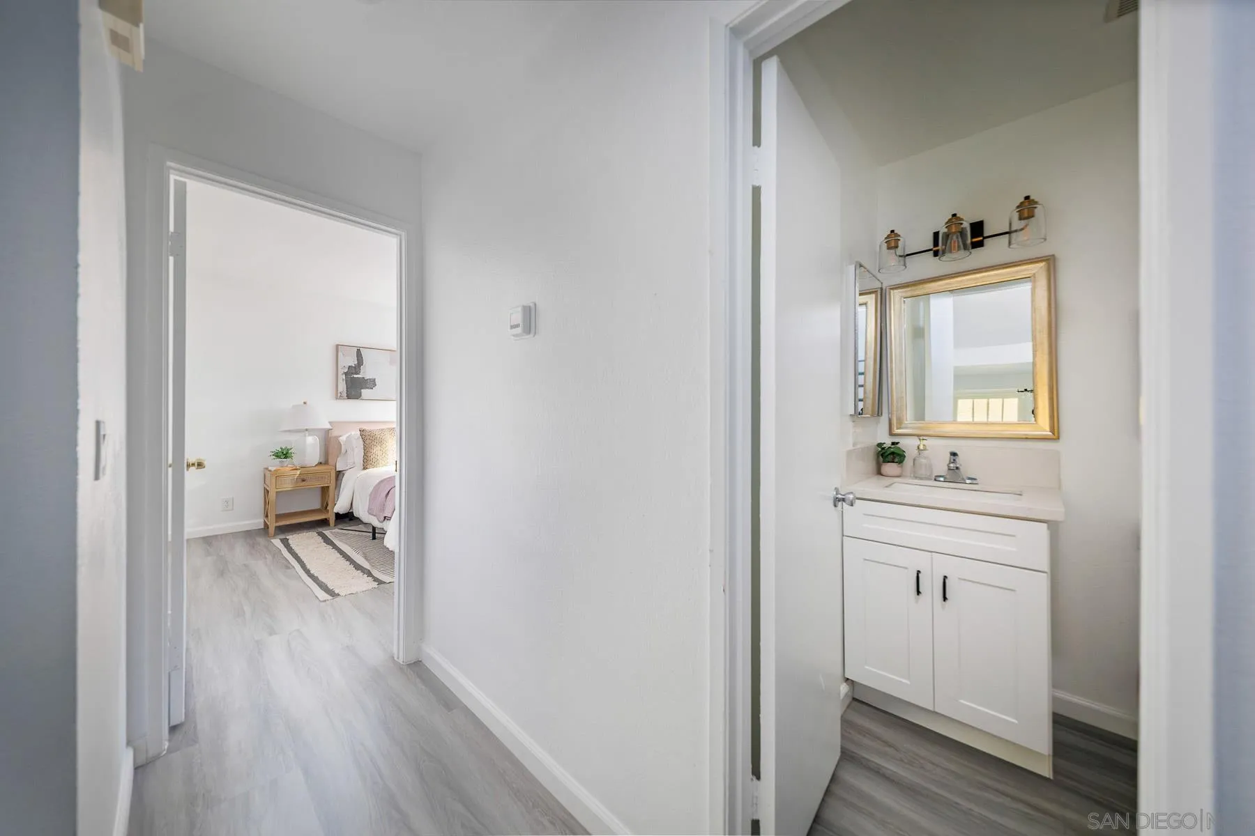 7325 Alicante Road, Unit A Carlsbad, CA 92009 - Photo 15 of 44 a hallway with view of living room