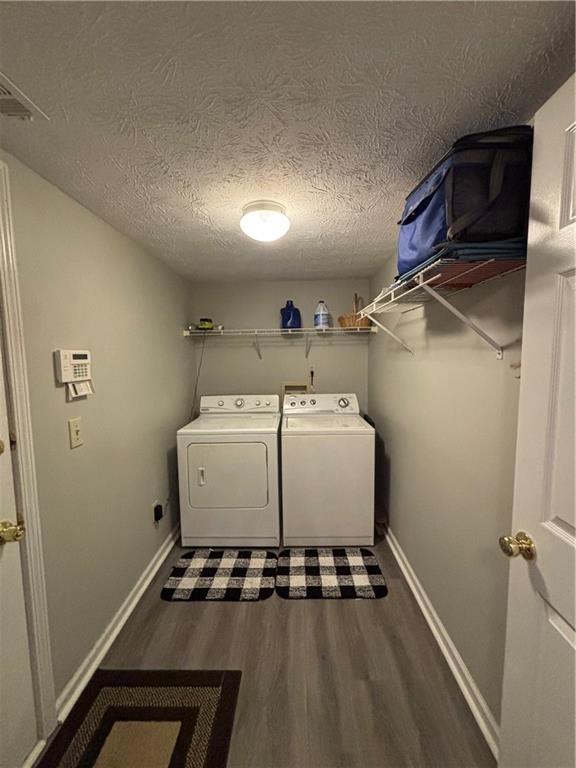 4949 Penscot Way Stone Mountain, GA 30088 - Photo 35 of 40 a utility room with dryer and washer