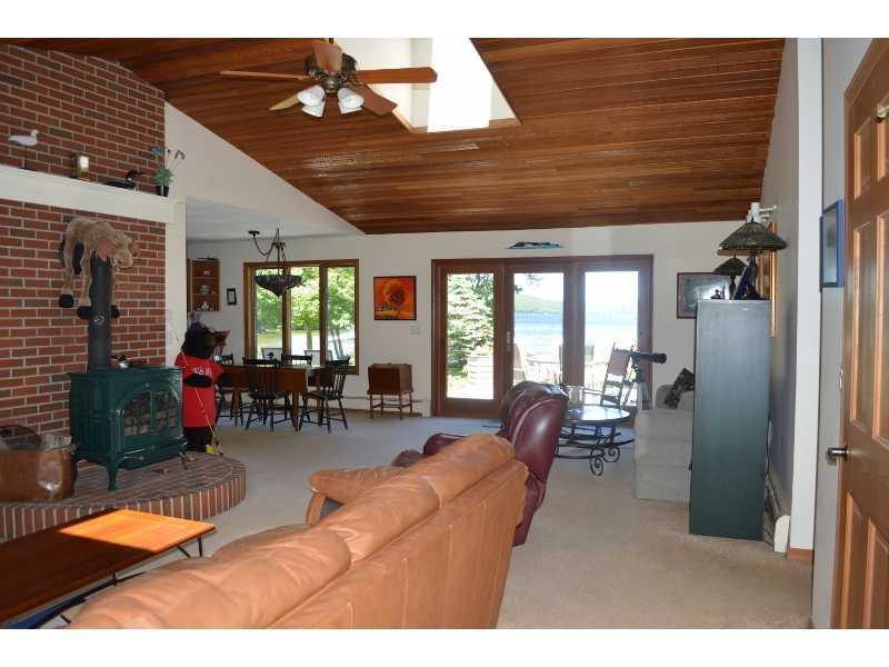 71 Stony Point Road Belgrade, ME 04917 - Photo 7 of 34 Living Room with a wood stove for...