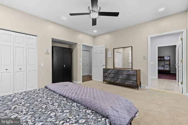 a living room with furniture gym equipment and a view of living room