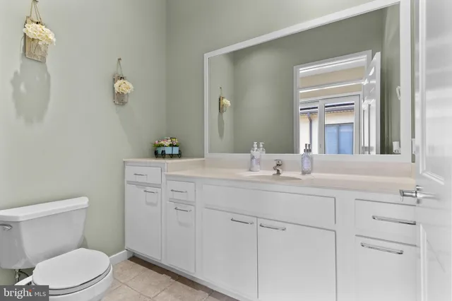 an aerial view of houses with yard