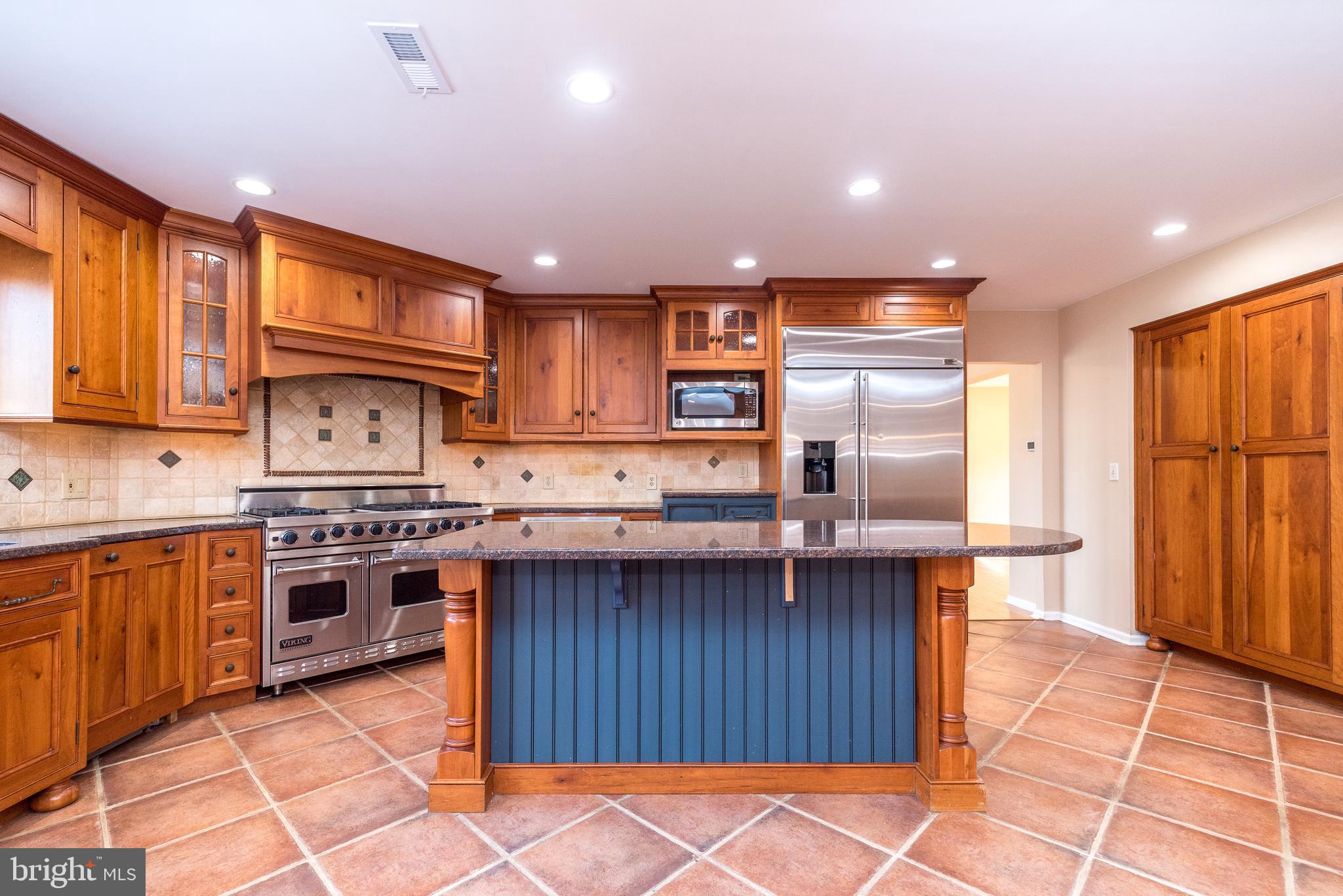 46 John Dyer Way Doylestown, PA 18902 - Photo 18 of 76 a kitchen with stainless steel appliances granite countertop a stove a sink dishwasher and a refrigerator