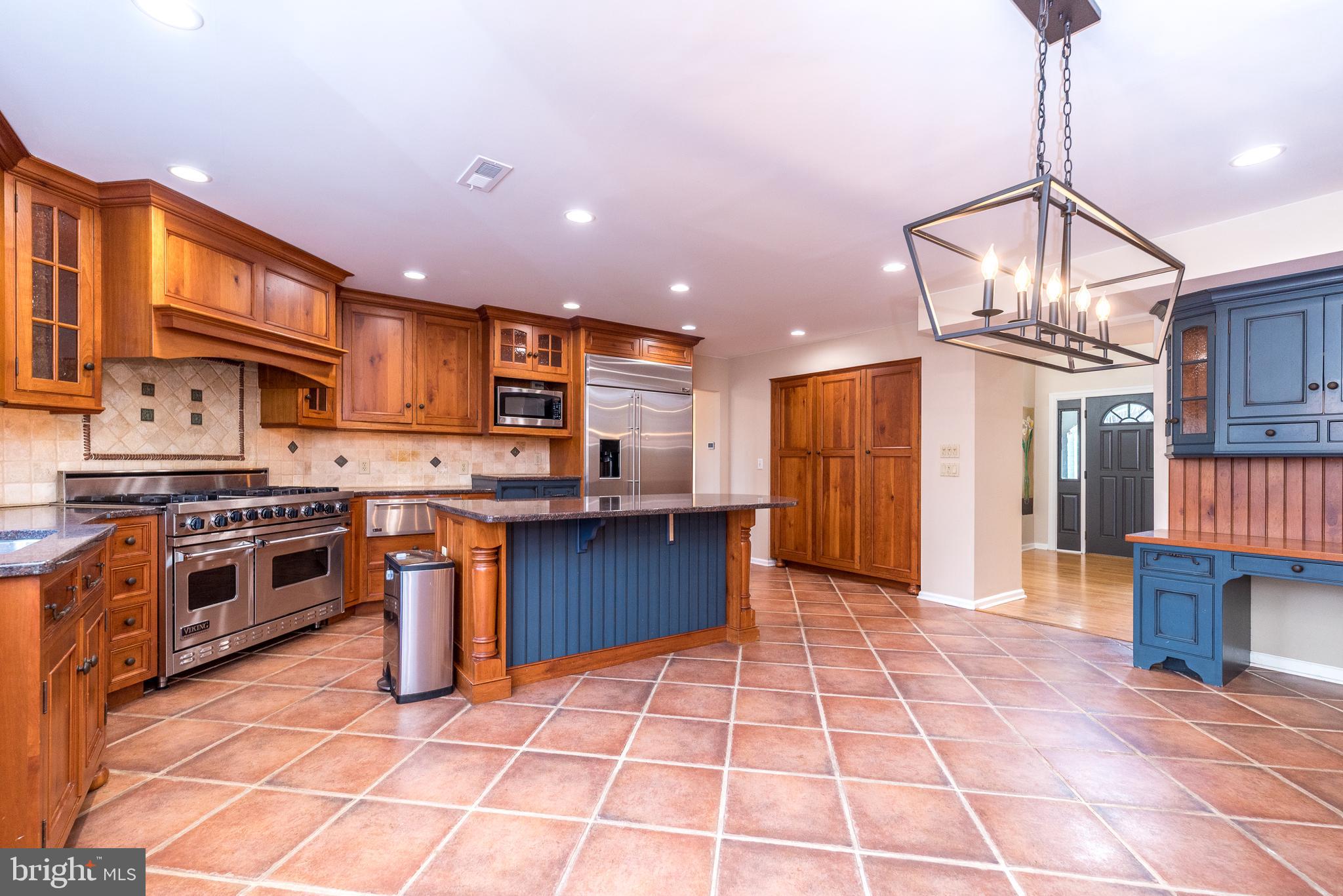 46 John Dyer Way Doylestown, PA 18902 - Photo 25 of 76 a large kitchen with stainless steel appliances granite countertop a stove granite counter tops and cabinets