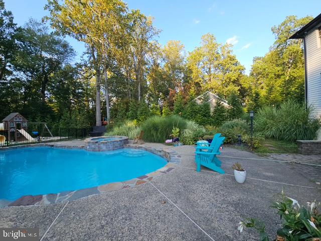 46 John Dyer Way Doylestown, PA 18902 - Photo 74 of 76 a view of a backyard with swimming pool