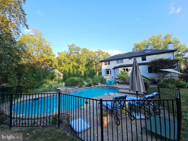 46 John Dyer Way Doylestown, PA 18902 - Photo 75 of 76 a view of a roof deck with wooden fence and floor