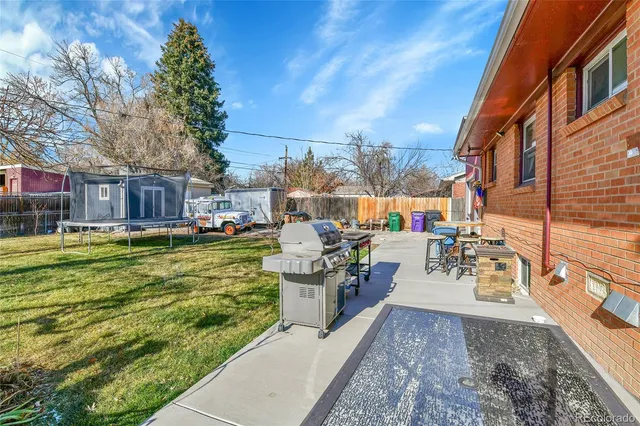 a view of a swimming pool with a patio