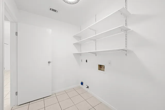 an aerial view of a house with garden