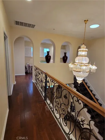 a view of entryway with wooden floor