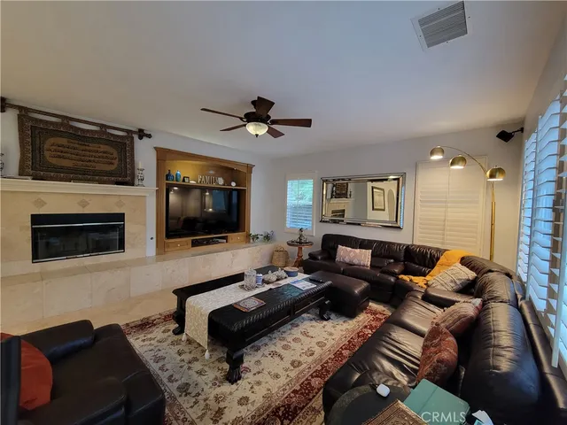 a view of a backyard with sitting area